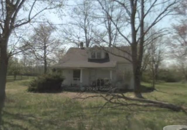 1400 Red Boiling Springs Rd, Lafayette, TN 37083 - back of house with a chimney