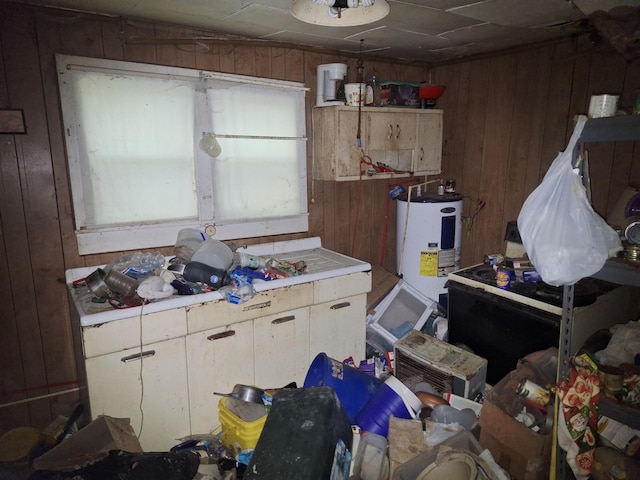 1400 Red Boiling Springs Rd, Lafayette, TN 37083 - kitchen featuring wood walls, water heater, and tile countertops