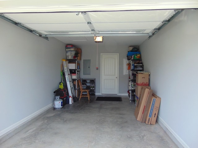 1920 Alysheba Run, Murfreesboro, TN 37128 - garage with electric panel, baseboards, and a garage door opener