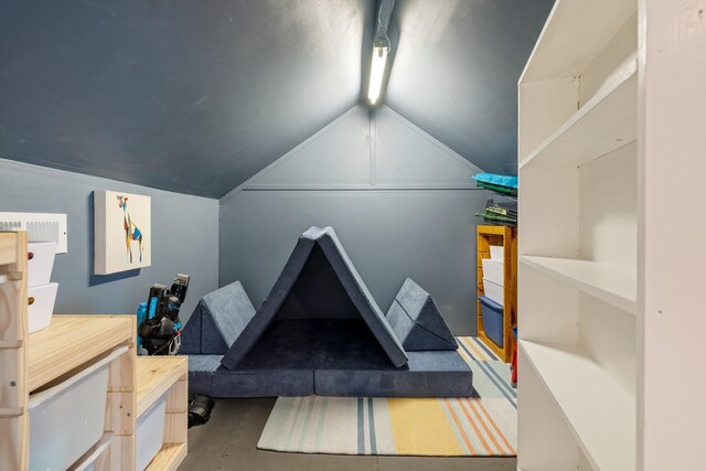 3448 Colebrook Dr, Thompsons Station, TN 37179 - bedroom with vaulted ceiling and concrete flooring