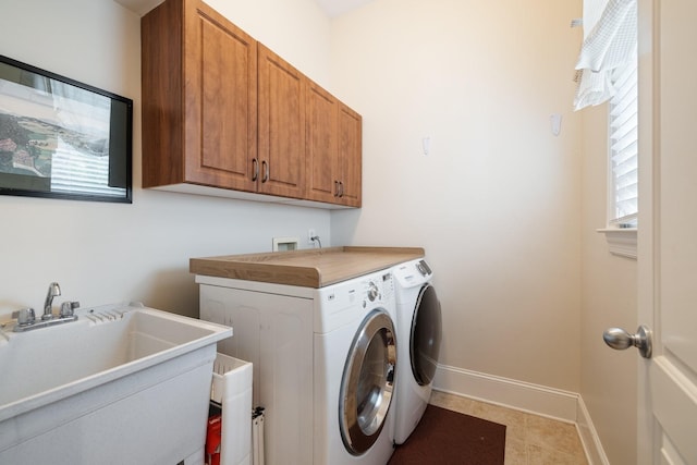 3448 Colebrook Dr, Thompsons Station, TN 37179 - washroom featuring cabinet space, washing machine and clothes dryer, baseboards, and light tile patterned floors