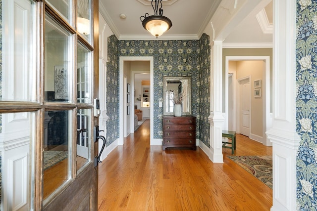 3448 Colebrook Dr, Thompsons Station, TN 37179 - foyer entrance with crown molding, wood finished floors, wallpapered walls, baseboards, and ornate columns