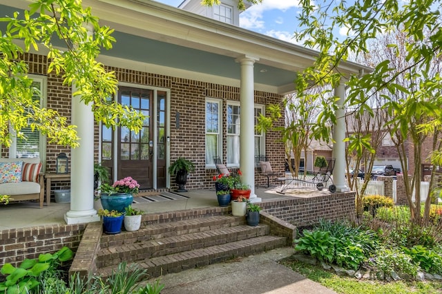 3448 Colebrook Dr, Thompsons Station, TN 37179 - property entrance with a porch and brick siding
