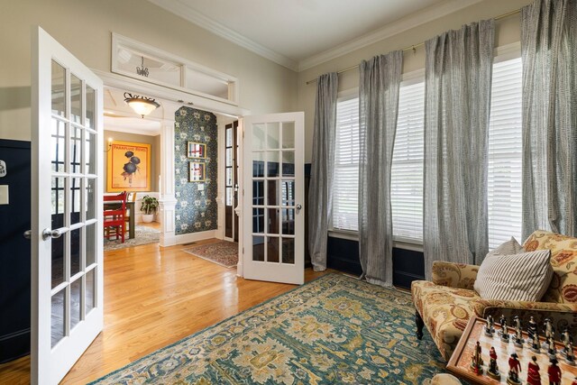 3448 Colebrook Dr, Thompsons Station, TN 37179 - living area featuring french doors, ornamental molding, and wood finished floors