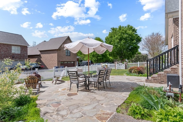 3448 Colebrook Dr, Thompsons Station, TN 37179 - view of patio with stairs, outdoor dining space, and a garage