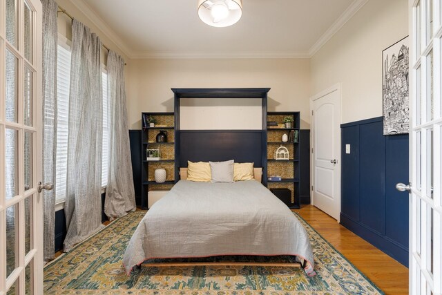 3448 Colebrook Dr, Thompsons Station, TN 37179 - bedroom with ornamental molding, french doors, and wood finished floors