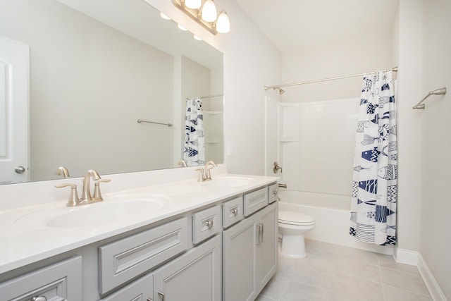 1016 Fenner Ln, Gallatin, TN 37066 - bathroom featuring double vanity, toilet, shower / bath combo with shower curtain, tile patterned floors, and baseboards