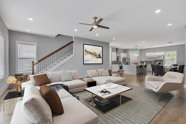 525 31st Ave N Unit A, Nashville, TN 37209 - living room featuring wood finished floors, recessed lighting, ceiling fan, stairs, and baseboards