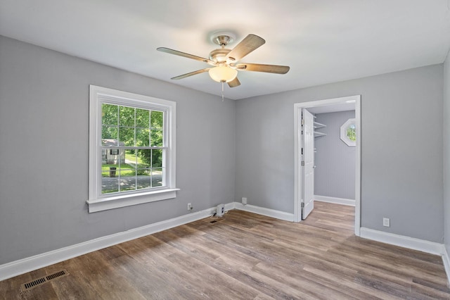 2614 Flamingo Dr, Nashville, TN 37207 - empty room with a ceiling fan, wood finished floors, and baseboards