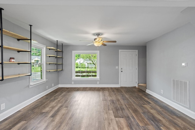2614 Flamingo Dr, Nashville, TN 37207 - empty room with dark wood finished floors, ceiling fan, and baseboards