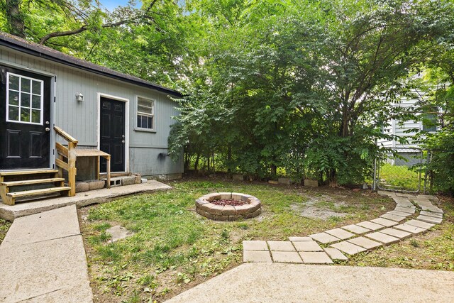 2614 Flamingo Dr, Nashville, TN 37207 - view of yard with a fire pit and entry steps