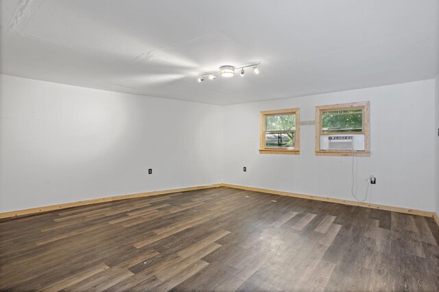 2614 Flamingo Dr, Nashville, TN 37207 - unfurnished room with wood finished floors, baseboards, and cooling unit
