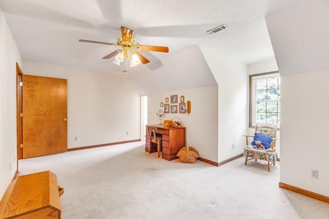 220 Winton Way Rd, Manchester, TN 37355 - living area featuring ceiling fan, carpet floors, baseboards, and lofted ceiling