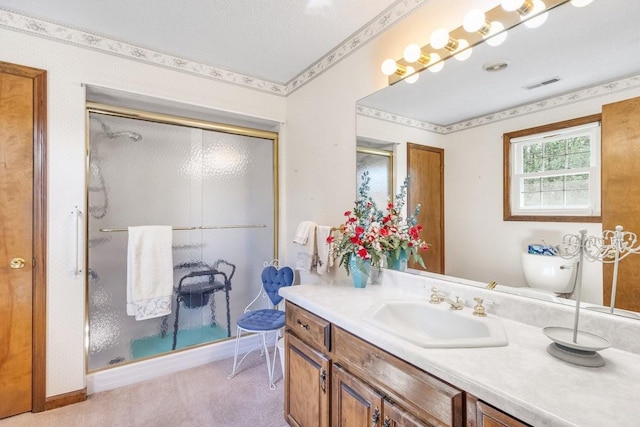 220 Winton Way Rd, Manchester, TN 37355 - full bath with vanity, a shower stall, toilet, and baseboards