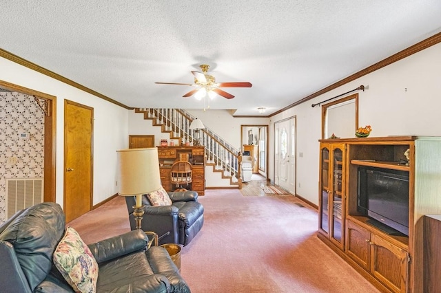 220 Winton Way Rd, Manchester, TN 37355 - living room with stairs, crown molding, ceiling fan, light carpet, and baseboards