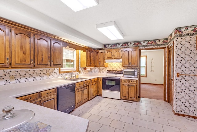 220 Winton Way Rd, Manchester, TN 37355 - kitchen with white electric range oven, black dishwasher, a sink, under cabinet range hood, and light countertops