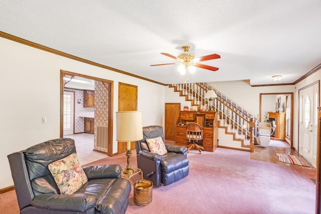 220 Winton Way Rd, Manchester, TN 37355 - carpeted living room with stairs, crown molding, a ceiling fan, baseboards, and a fireplace