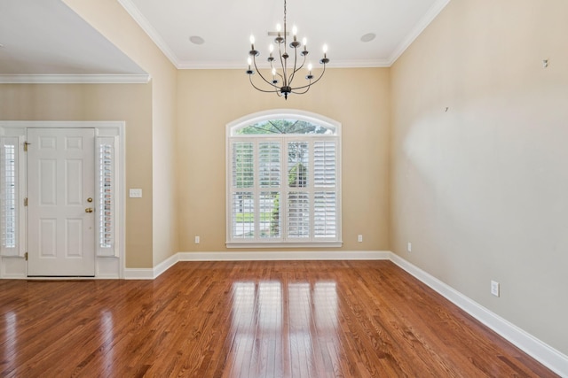 204 Magnolia Glen Ct, Manchester, TN 37355 - entrance foyer featuring a chandelier, wood finished floors, crown molding, and baseboards