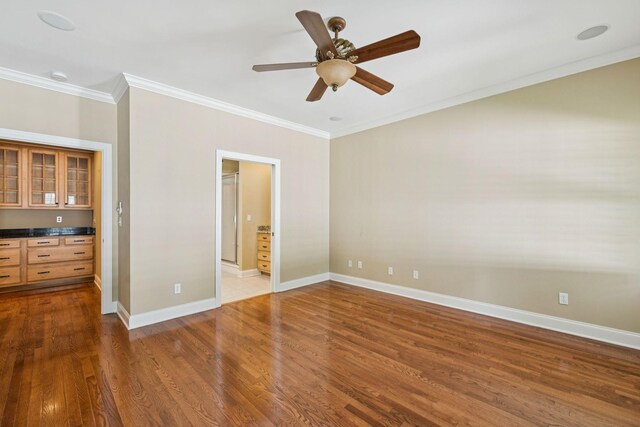 204 Magnolia Glen Ct, Manchester, TN 37355 - unfurnished bedroom with wood finished floors, baseboards, crown molding, a ceiling fan, and ensuite bath