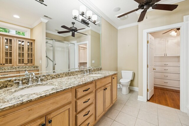 204 Magnolia Glen Ct, Manchester, TN 37355 - full bath featuring ceiling fan, a shower stall, tile patterned flooring, ornamental molding, and double vanity