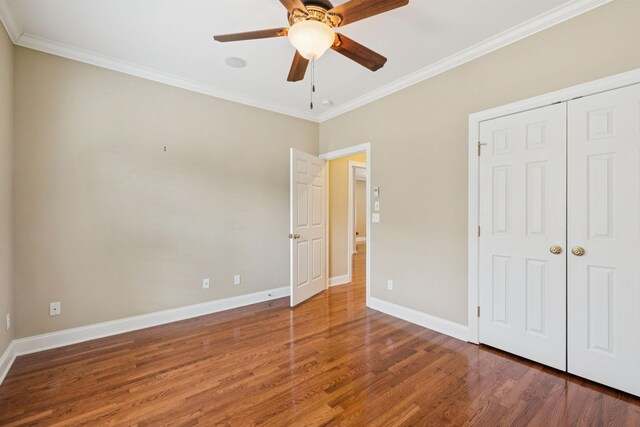 204 Magnolia Glen Ct, Manchester, TN 37355 - unfurnished bedroom with wood finished floors, crown molding, baseboards, a closet, and a ceiling fan