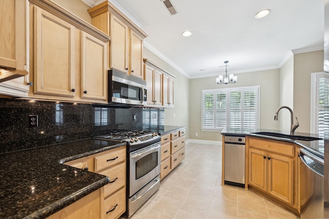 204 Magnolia Glen Ct, Manchester, TN 37355 - kitchen with appliances with stainless steel finishes, a sink, tasteful backsplash, a chandelier, and light brown cabinetry