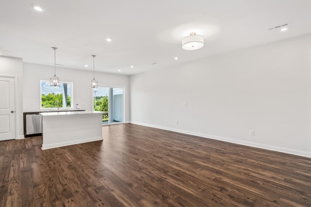 2206 Melk Ln, Columbia, TN 38401 - unfurnished living room with dark wood-type flooring, baseboards, and recessed lighting