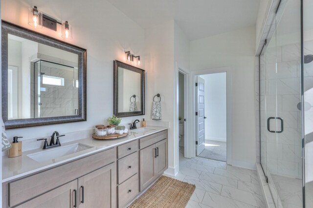 471 Triple Crown Cir, Gallatin, TN 37066 - bathroom with marble look tile flooring, double vanity, a shower stall, and toilet