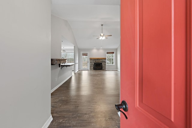 3609 Chunn Valley Dr, Spring Hill, TN 37174 - unfurnished living room featuring ceiling fan, vaulted ceiling, a fireplace, and baseboards