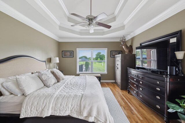 1926 Cliffview Ct, Murfreesboro, TN 37128 - bedroom featuring a raised ceiling, multiple windows, light wood-type flooring, crown molding, and ceiling fan