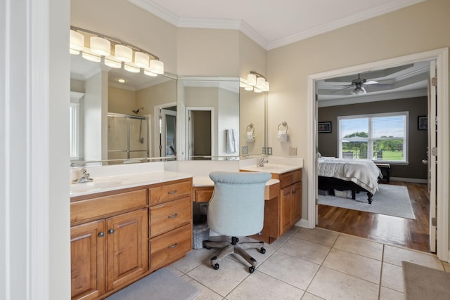 1926 Cliffview Ct, Murfreesboro, TN 37128 - ensuite bathroom with crown molding, a shower stall, vanity, tile patterned flooring, and ceiling fan