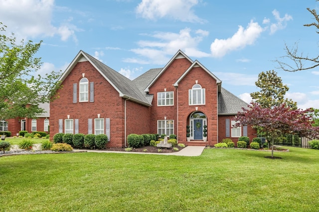 1926 Cliffview Ct, Murfreesboro, TN 37128 - traditional-style house with brick siding, a front lawn, and a shingled roof