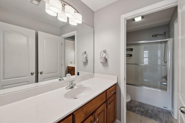 1926 Cliffview Ct, Murfreesboro, TN 37128 - bathroom with vanity, combined bath / shower with glass door, toilet, and tile patterned floors