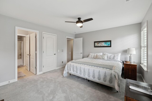1926 Cliffview Ct, Murfreesboro, TN 37128 - bedroom with carpet flooring, baseboards, ceiling fan, and connected bathroom