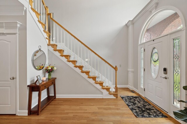 1926 Cliffview Ct, Murfreesboro, TN 37128 - entryway with a high ceiling, wood finished floors, stairs, and baseboards
