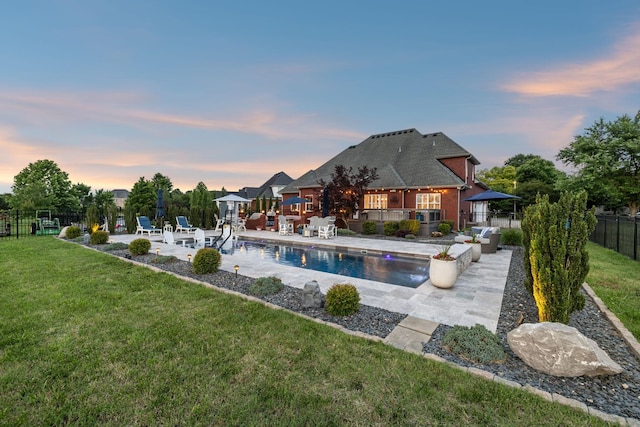 1926 Cliffview Ct, Murfreesboro, TN 37128 - pool at dusk with a patio area