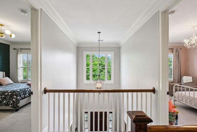 1577 Westhaven Blvd, Franklin, TN 37064 - hallway with a chandelier, ornamental molding, healthy amount of natural light, and carpet