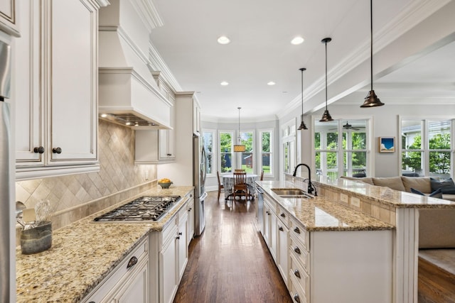 1577 Westhaven Blvd, Franklin, TN 37064 - kitchen featuring a sink, appliances with stainless steel finishes, premium range hood, healthy amount of natural light, and recessed lighting