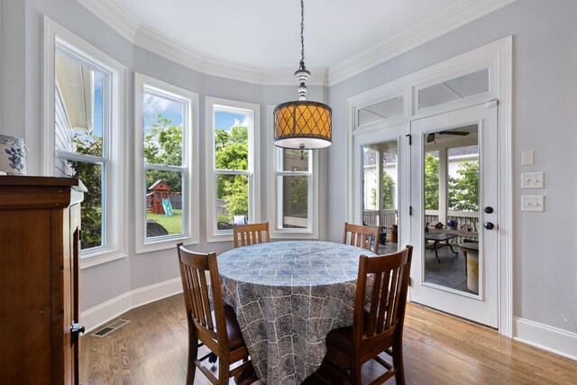1577 Westhaven Blvd, Franklin, TN 37064 - dining area featuring baseboards, wood finished floors, healthy amount of natural light, and crown molding