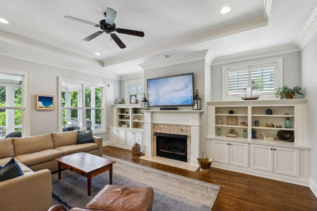 1577 Westhaven Blvd, Franklin, TN 37064 - living room with dark wood finished floors, a fireplace with flush hearth, ceiling fan, crown molding, and recessed lighting