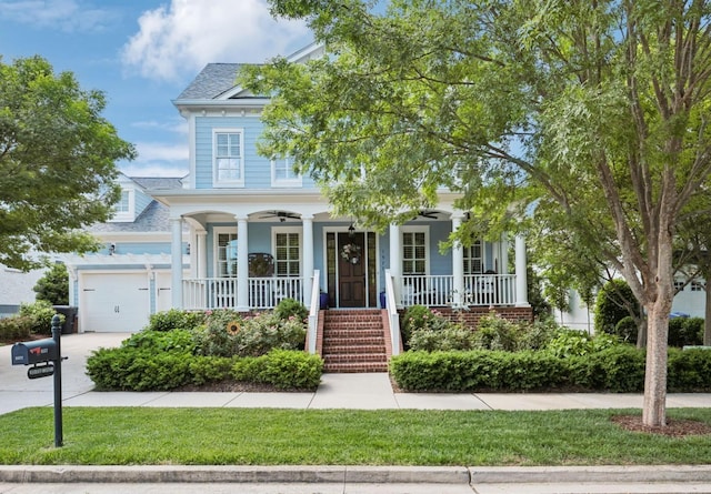 1577 Westhaven Blvd, Franklin, TN 37064 - view of front of house featuring a porch, an attached garage, driveway, stairs, and roof with shingles