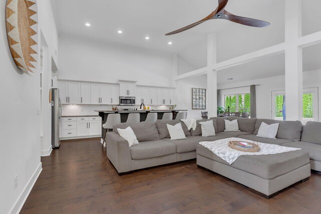 1240 Hensfield Dr, Murfreesboro, TN 37128 - living room featuring high vaulted ceiling, recessed lighting, dark wood-style floors, ceiling fan, and baseboards