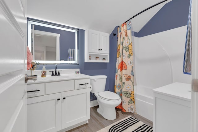 1240 Hensfield Dr, Murfreesboro, TN 37128 - bathroom featuring vanity, toilet, shower / bathtub combination with curtain, wood finished floors, and lofted ceiling