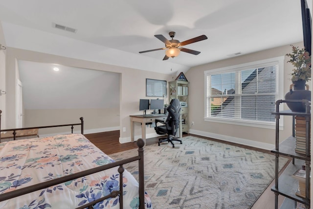1240 Hensfield Dr, Murfreesboro, TN 37128 - bedroom featuring lofted ceiling, an office area, baseboards, wood finished floors, and ceiling fan
