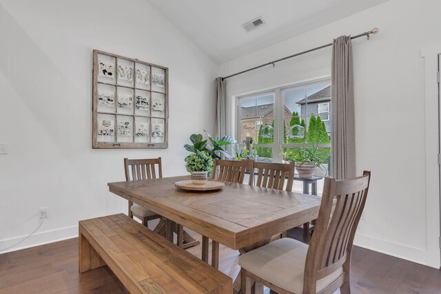 1240 Hensfield Dr, Murfreesboro, TN 37128 - dining room with vaulted ceiling, baseboards, and wood finished floors