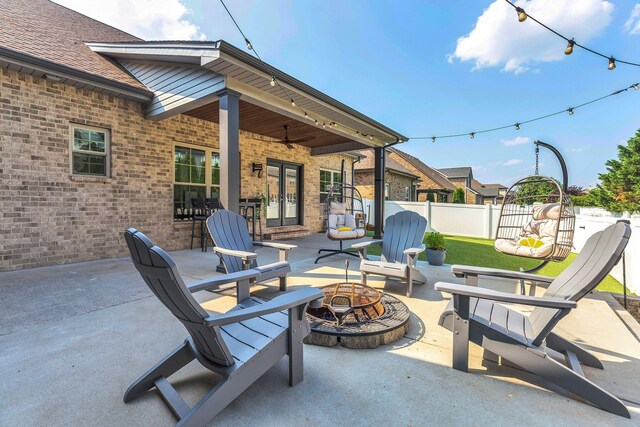 1240 Hensfield Dr, Murfreesboro, TN 37128 - view of patio / terrace featuring a fire pit and french doors