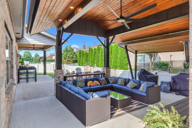 1240 Hensfield Dr, Murfreesboro, TN 37128 - fenced backyard with outdoor dining area, ceiling fan, an outdoor living space, and a patio