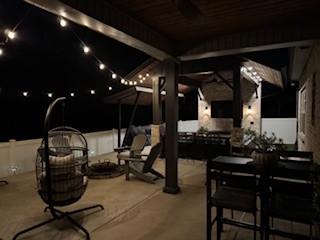 1240 Hensfield Dr, Murfreesboro, TN 37128 - patio at twilight featuring a patio and an outdoor living space