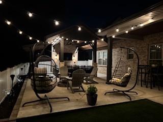 1240 Hensfield Dr, Murfreesboro, TN 37128 - patio at twilight with a patio