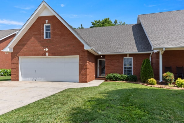 362 Chase Cir, Winchester, TN 37398 - view of front of home with a shingled roof, brick siding, a front lawn, and concrete driveway